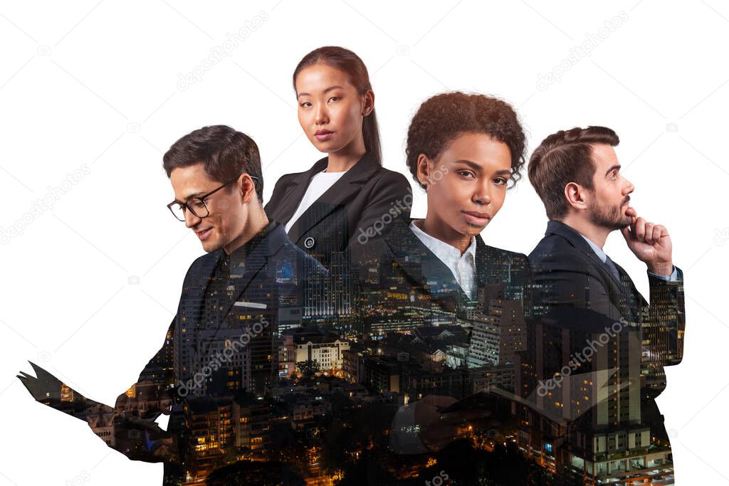 Double exposure of four young, successful, business people standing in front of Asian city Bangkok background. Concept of international teamwork together. Night time.