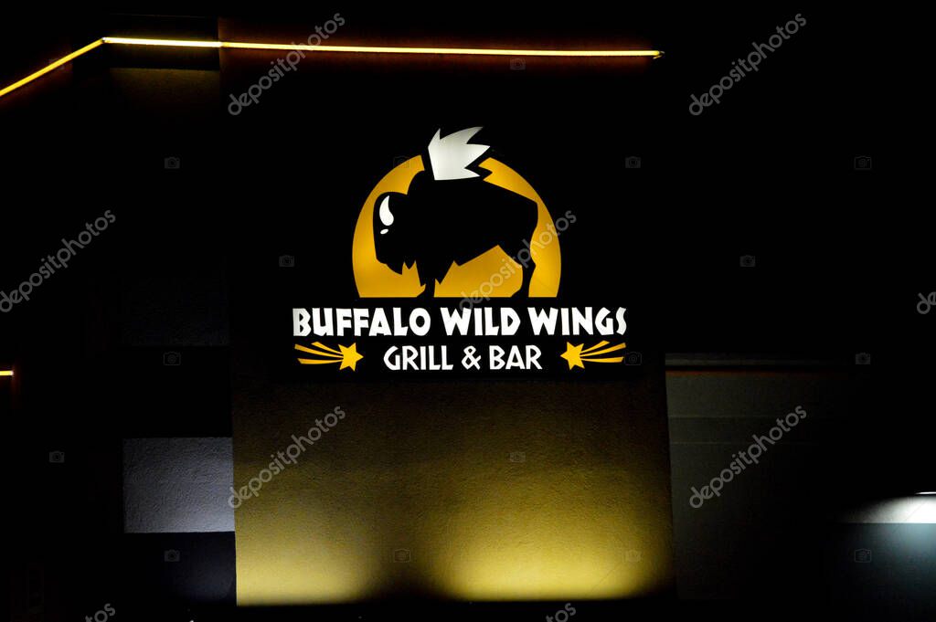 Columbus, Ohio-USA June 30,2019: Buffalo Wild Wings restaurant night sign illumination.