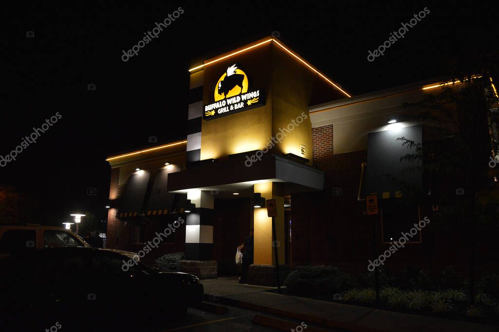 Columbus, Ohio-USA June 30,2019: Buffalo Wild Wings restaurant night sign illuminatio