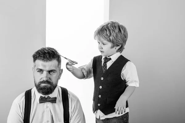 Senior man visiting hairstylist in barbershop. Senior man visiting hairstylist in barbershop. Hair style and hair stylist. Barber scissors. Great time at barbershop.