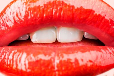 Passion. Sensual female lips. White healthy teeth. Mouth with teeth smile. Red lipstick and sexy kiss. Lips close up clipart