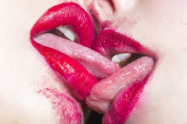 Deep womans kiss. Female love. Lesbians kissing with red lipstick. Closeup of pair women mouths kissing. Two beautiful lesbian girls being intimate. Cosmetics for women. Delicious Erotic Lipstick — Stock Photo, Image