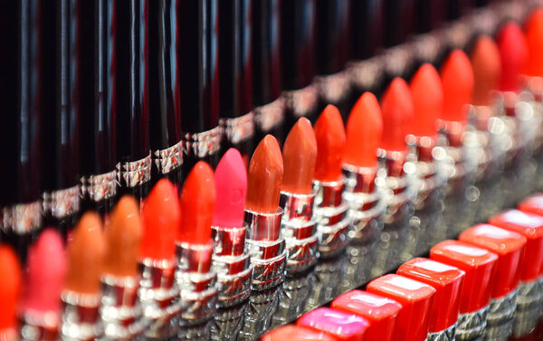 Set of marsala color lipstick. Fashion Colorful Lipsticks palette, Professional Makeup and Beauty. Beautiful Make-up concept. Lipgloss. Lipsticks closeup. Cosmetics store. Female beauty.