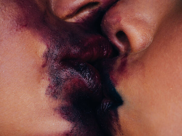 Sexy mouth. Two women friends kissing. Lesbian concept. Mouths with dark purple lips in movements, closing, lip biting. Paint. Face. Kiss.