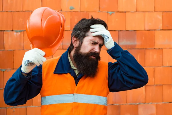 Problems at the construction site. The collapse of the building. Problems with the management in building business. Violation of labor protection law. Sad builder.