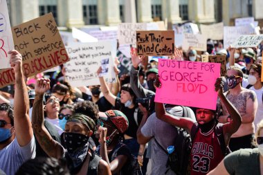 Miami Downtown, FL, USA - MAY 31, 2020: Justice for George Floyd poster. No justice no peace. Demonstration against racism, US activist. Emotional anti racism demonstrations. Protests in US. clipart