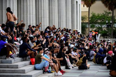 Miami Downtown, FL, USA - JUNE 12, 2020: Black Lives Matter. Demonstrators during protests against racism in USA. clipart