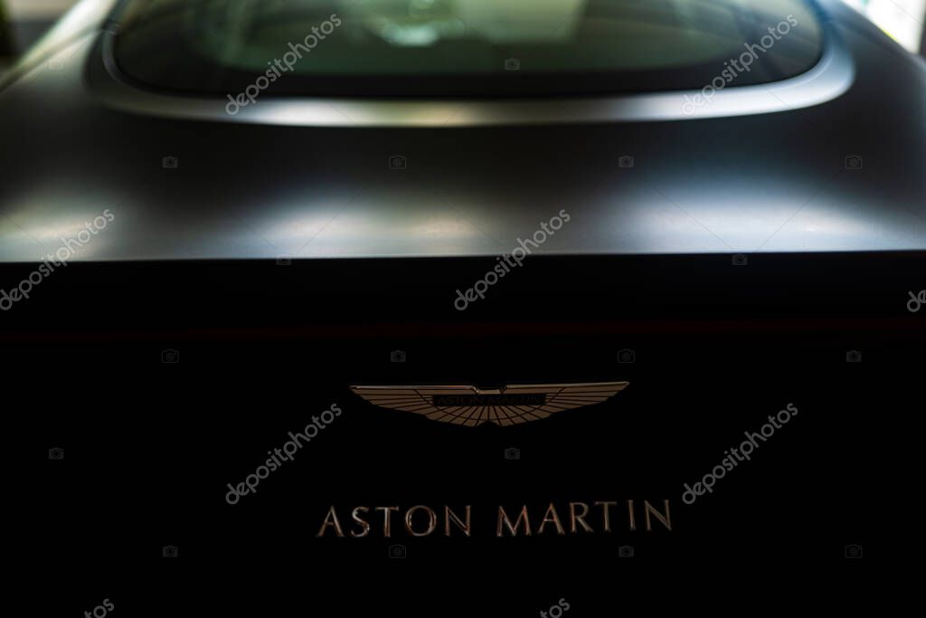 Miami, Florida, USA - JUNE 2020: Aston Martin logo. Super car. Beautiful expensive car. Horsepower. Elegant transport Luxury life