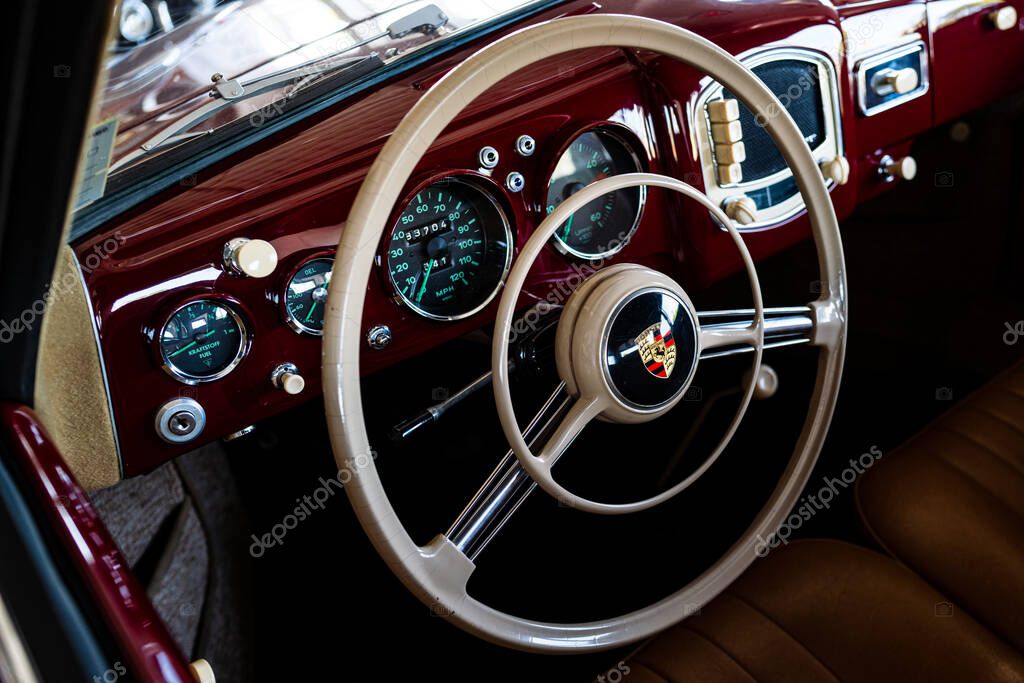 Miami, Florida, USA - JUNE 2020: Super car. Beautiful expensive car. Horsepower. Porsche steering wheel. Horsepower Horse logo