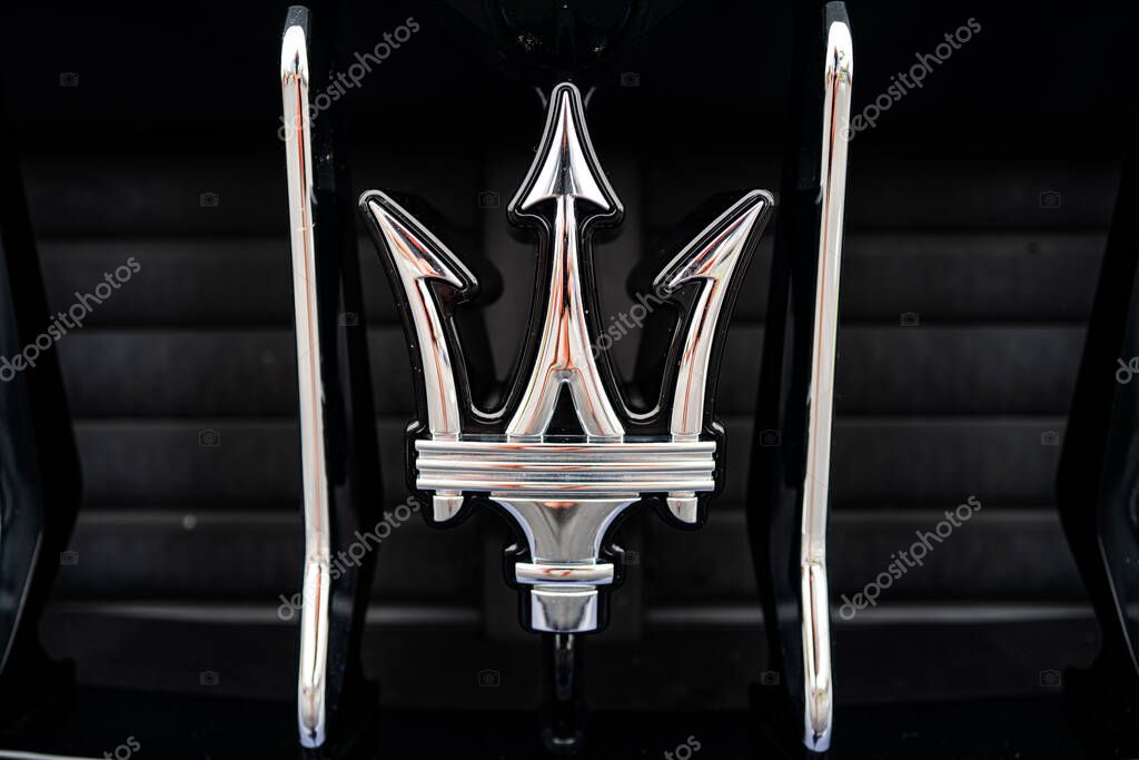 Miami, Florida, USA - JUNE 2020: Maserati logo. Super car. Beautiful expensive car Horsepower
