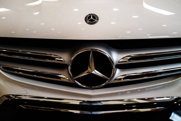 Miami, Florida, USA - JUNE 2020: White Mercedes Benz. Mercedez logo. Super car. Beautiful expensive car Horsepower.