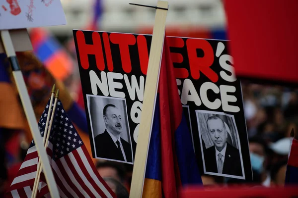 Los Angeles, California, USA - October 2020: Armenian Diaspora calls Turkey and Azerbaijan terrorists because of situation in Artsakh. Demonstration with posters. Armenians declare terror in Artsakh. — Stock Photo, Image