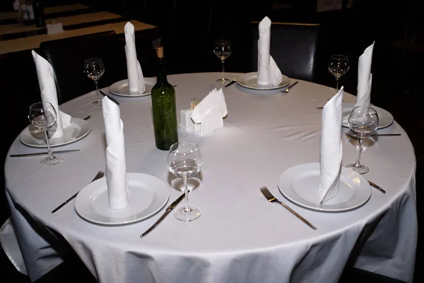 Laid table for guests. Table setting.