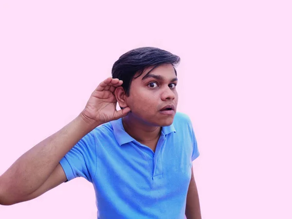 Man put hand over ear to listen carefully — Stock Photo, Image