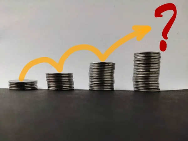 Increasing piles of coins with going up trend line with question mark , Concept for bullish market and economy growth — Stock Photo, Image
