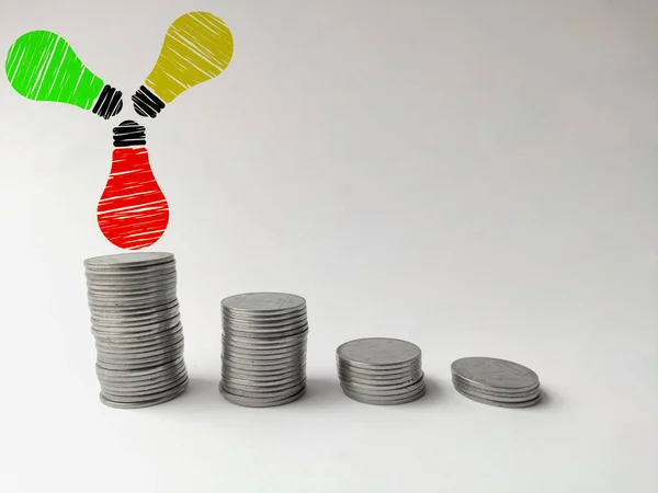 Increasing coin stack with bulbs idea and imagination concept — Stock Photo, Image