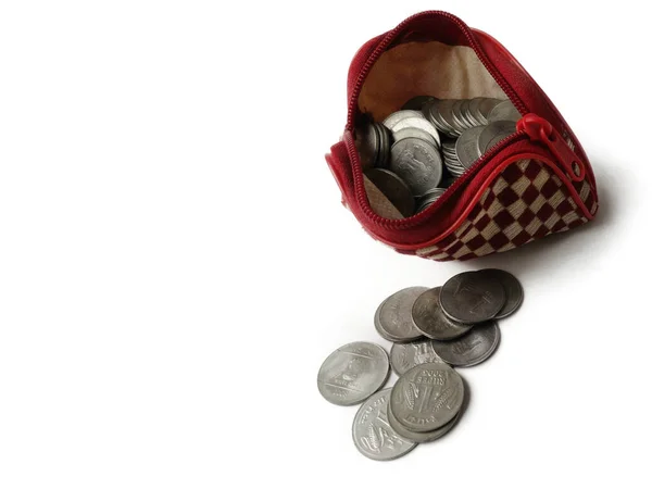 Coins in ladies purse on White background — Stock Photo, Image