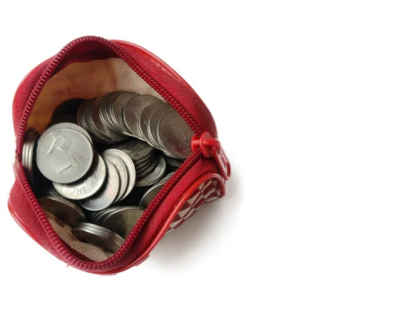 Coins in ladies purse on White background — Stock Photo, Image