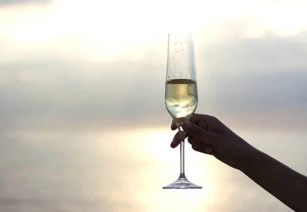 Silhouette Female Hand Full Glass Champagne Beach Sunrise Background Sea — Stock Photo, Image
