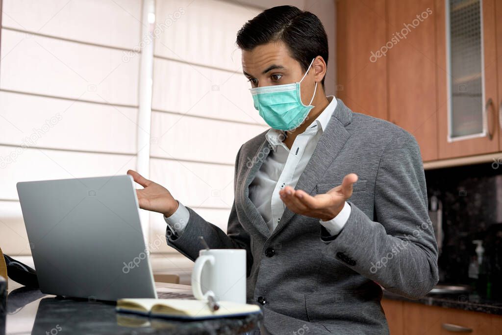 boy telecommuting with mask, laptop and well dressed