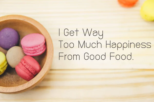 French macaroons on sack with wood background on filter color , food quote