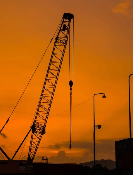 construction site silhouette on sunset time .