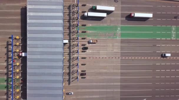 Aerial view of highway with Cars at modern toll road turnpike, entry fee pay gate. — Stock Video