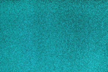 Şenlikli mavi parıltılı Noel arkaplanı. Işık efektiyle parıldayan yüzey. Bulanık, bokeh, dağılmış.