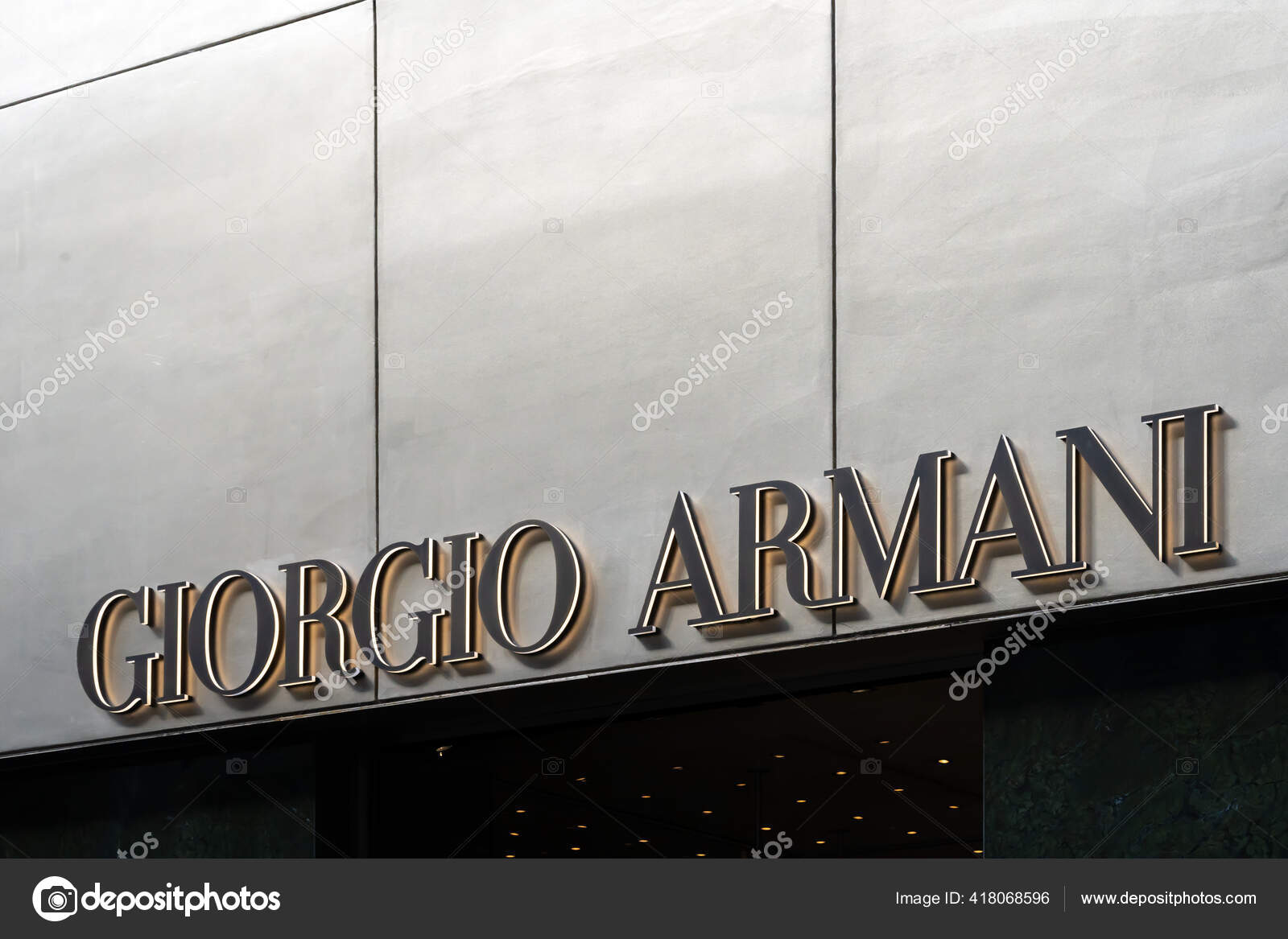 Giorgio Armani logo of store in Milans Fashion District. Montenapoleone  area. Giorgio Armani is a high-end label specializing in accessories,  glasses, cosmetics. Milan, Italy - 24.09.2020 – Stock Editorial Photo ©  photo-lime #418068596