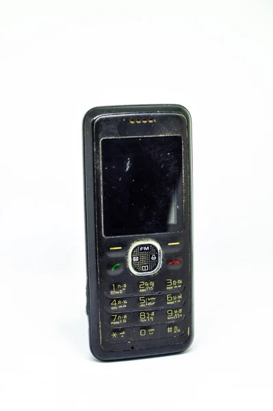 白い背景の古い携帯電話は — ストック写真