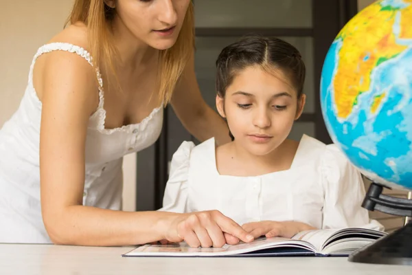 Young Mother Her Little Daughter White Dress Reading Book Together Royalty Free Stock Images