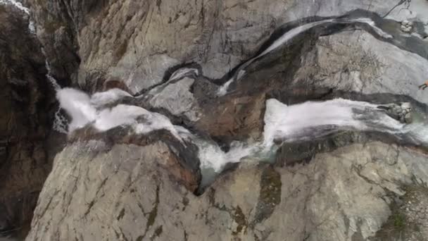 Slow Motion Aerial Shot Waterfall Water Flowing Cliff Man Standing — Stock Video