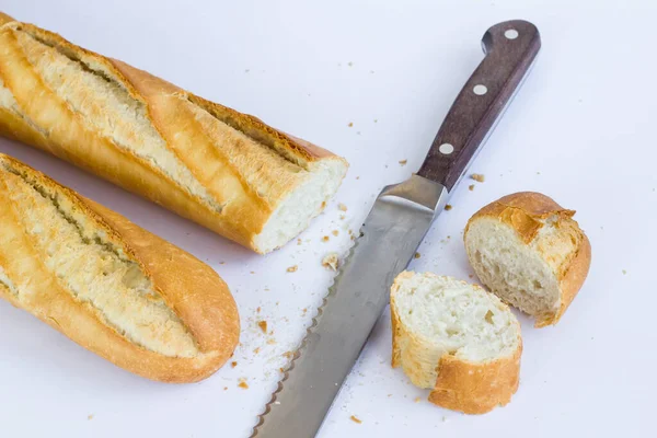 Fresh Baguette Breads White Surface Knife Sliced — Stock Photo, Image