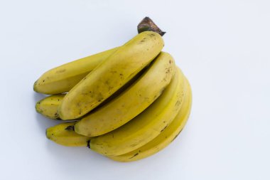 Beyaz zemin üzerinde Türk ve yerli muz kopyalama alanı.