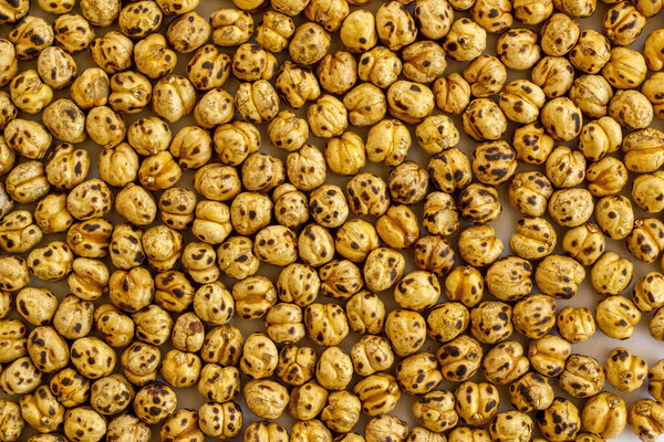 Yellow chickpeas background,top view,flat layout