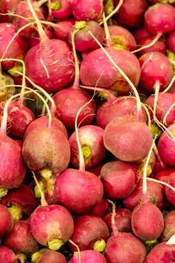 Pazar ya da pazarda turp yığını, arka plan