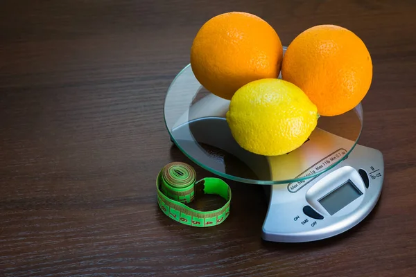 Diet. Restriction in nutrition. Measuring tape on the table with space for text. Slimming. Weight loss concept, weight management, change to a healthy lifestyle, weight loss health and social problem