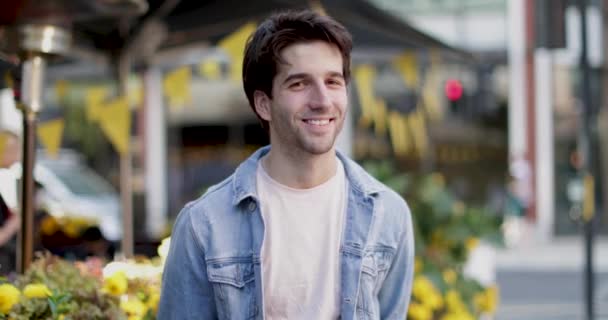 Portrait of young adult male looking to camera — Stock Video