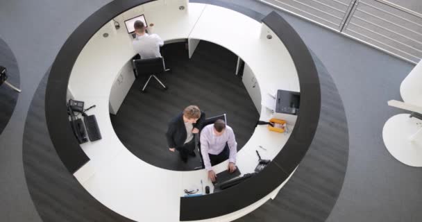 Overhead shot of people working in an office — Stock Video