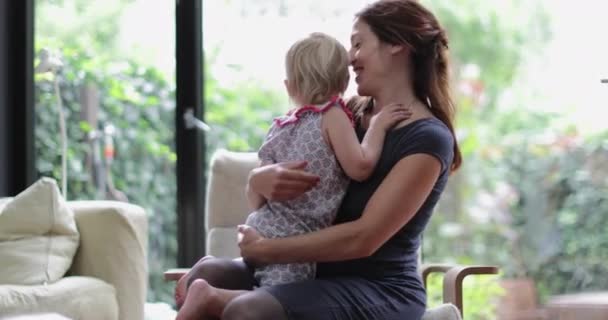 Mother Kissing Cuddling Child — Stock Video