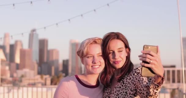 Female Friends Taking Selfie City Skyline Background — Stock Video