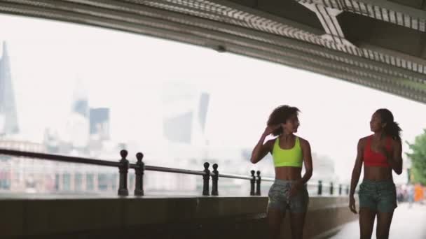 Young Adult Female Friends Running Together Urban Environment — Stock Video