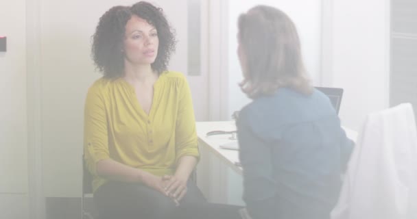 Female Medical Doctor listening to patient symptoms — Stock Video