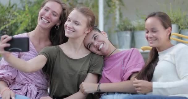 Group of female friends taking selfie on smart phone — Stock Video