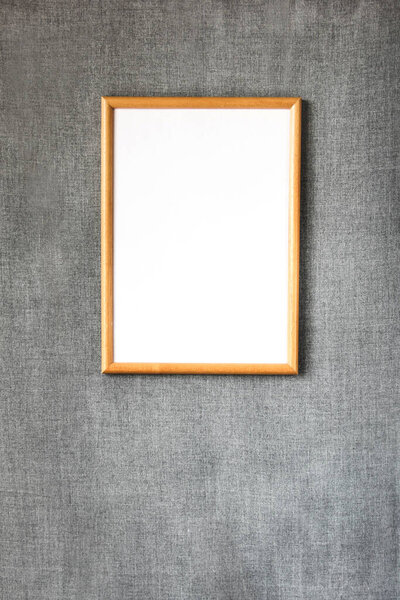 Frame on a gray wall. Blank picture
