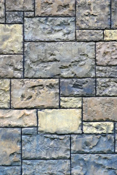 Fond gothique avec mur de briques de pierres. Fissures et rayures — Photo