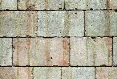 Taş duvarlı gotik bir arka plan. Çatlaklar ve çizikler