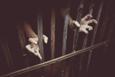 Eller Vintage sesi ile kafes hücre. Mülteci kavramı