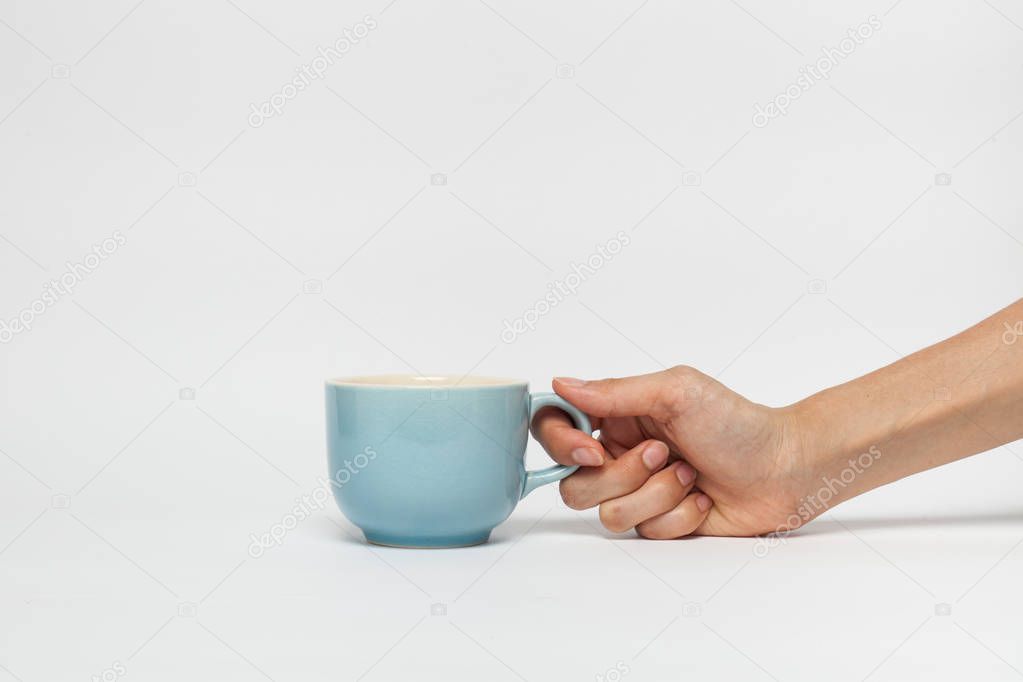 hand sign posture hold coffee cup in isolated