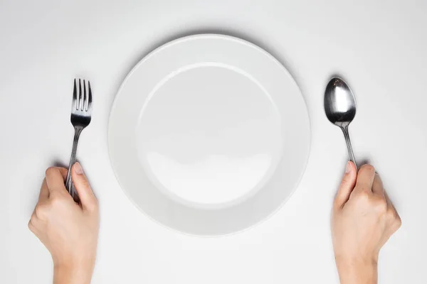Tenedor y cuchara y plato vacío —  Fotos de Stock